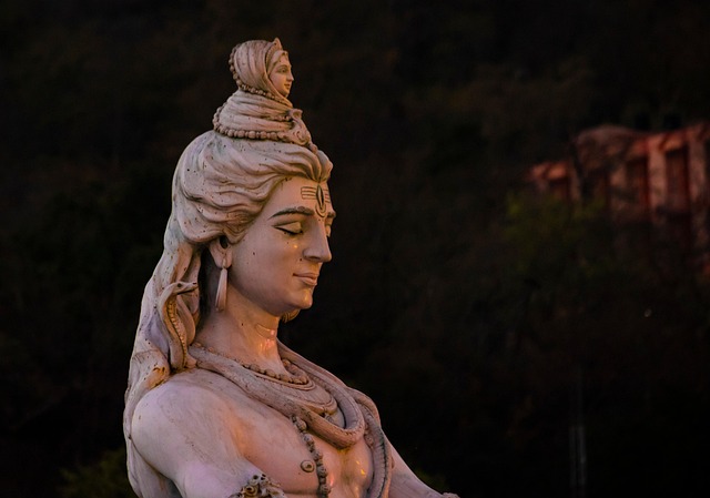 Shiva in sideview meditating.